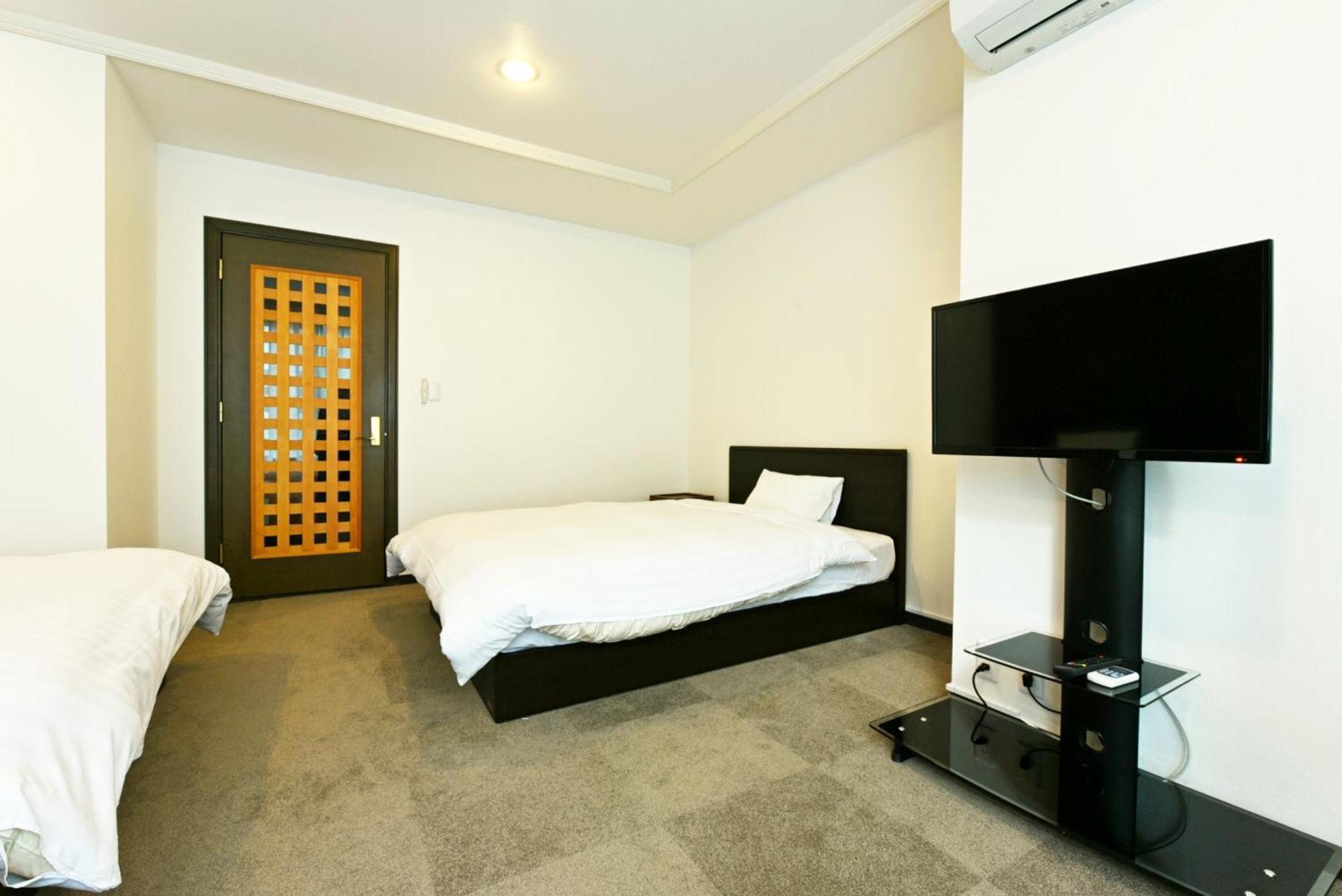 Hostel PLEASURE MARUYAMA Sapporo Zimmer foto